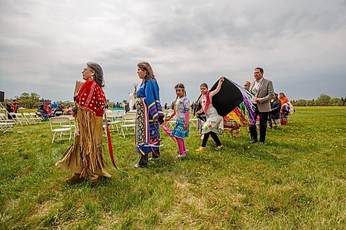 Mike Deal / Winnipeg Free Press
Leaders and dancers end the ceremony with the Retreat of Eagle Staff Flags during the Treaty One Nation Land Reclamation Ceremony for the Naawi-Oodena Treaty One Jointly Held lands, on the former Kapyong Barracks lands in Winnipeg, Wednesday morning.
230524 - Wednesday, May 24, 2023.