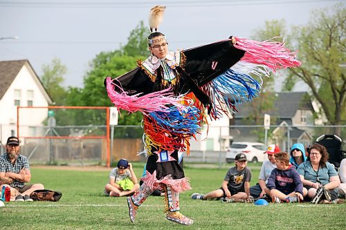 Lennyn Paskemin performs a fancy shawl dance for visitors to the Light Up Your Dance Powwow demonstration at Betty Gibson School in Brandon on Tuesday evening. (Tim Smith/The Brandon Sun)