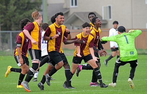 Crocus Plainsmen Alan Cruz, centre, celebrates his game-winning goal with his teammates and brother, Dylan (1), during the Brandon High School Soccer League boys' final against the Vincent Massey Vikings at Massey on Wednesday. (Thomas Friesen/The Brandon Sun)