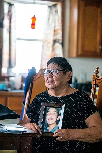 MIKAELA MACKENZIE / WINNIPEG FREE PRESS
 
 Janet Bruyere, grandmother of Fonassa Bruyere (whose body was discovered in a field northwest Winnipeg in 2007), poses for a portrait with a photo of Fonassa in her home on Sagkeeng First Nation on Tuesday, May 23, 2023. For Shelley story.

Winnipeg Free Press 2023.