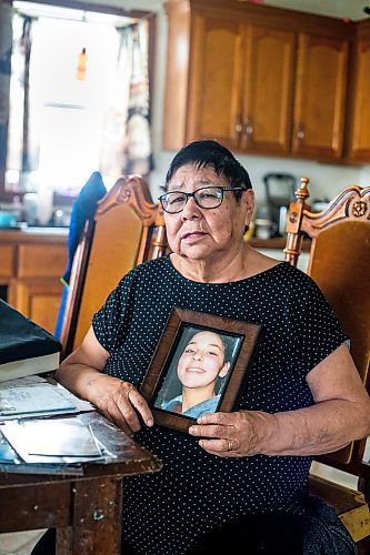 MIKAELA MACKENZIE / WINNIPEG FREE PRESS
 
 Janet Bruyere, grandmother of Fonassa Bruyere (whose body was discovered in a field northwest Winnipeg in 2007), poses for a portrait with a photo of Fonassa in her home on Sagkeeng First Nation on Tuesday, May 23, 2023. For Shelley story.

Winnipeg Free Press 2023.