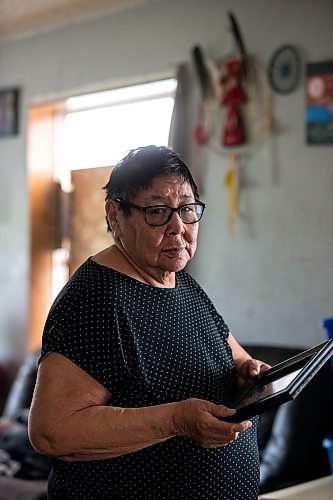 MIKAELA MACKENZIE / WINNIPEG FREE PRESS
 
 Janet Bruyere, grandmother of Fonassa Bruyere (whose body was discovered in a field northwest Winnipeg in 2007), poses for a portrait with a photo of Fonassa in her home on Sagkeeng First Nation on Tuesday, May 23, 2023. For Shelley story.

Winnipeg Free Press 2023.