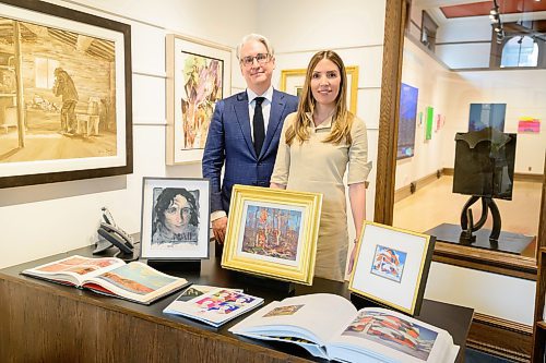 Mike Sudoma/Winnipeg Free Press
(Left to Right) Rob Cowley and Lydia Abbot of Abbot Cowley Auctions at Mayberry Fine Art Wednesday morning
May 224, 2023