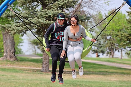 24052023
Kaidence Bone and Sinica Boyer swing together at Rideau Park on a sunny Wednesday afternoon.
(Tim Smith/The Brandon Sun)