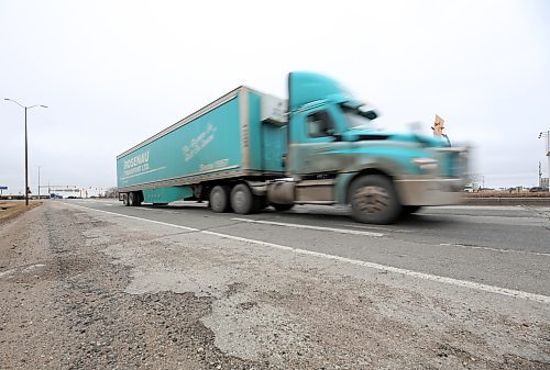 A semi truck roles through Brandon along the Trans-Canada Highway on Monday afternoon. (Matt Goerzen/The Brandon Sun)