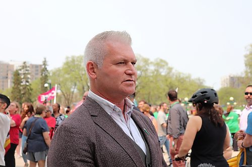 Jason Linklater, president the of Manitoba Association of Health Care Professionals, speaks to media after a rally at the Manitoba legislature on May 16, 2023. (Tyler Searle / Winnipeg Free Press)