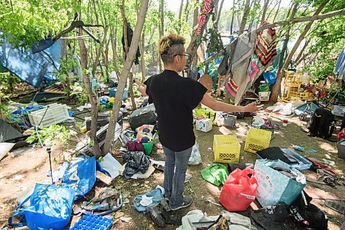 Mike Sudoma/Winnipeg Free Press
Cathy Smith shows a space where she&#x2019;d like to clean and open up a business selling clothing and other items near her home at an encampment along the Red River near Waterfront Drive Friday morning 
May 26, 2023