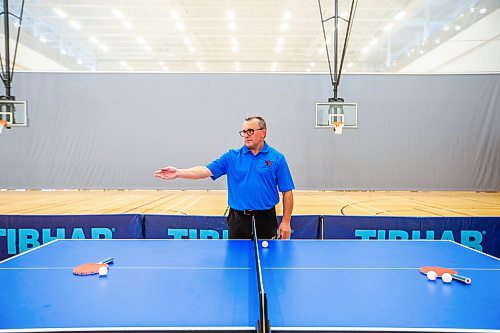 MIKAELA MACKENZIE / WINNIPEG FREE PRESS
 
Table Tennis official Greg Dzioba, who recently became the first official in North America to achieve the highest certification in the sport, demonstrates how he would make a call at Sport Manitoba on Thursday, May 25, 2023.  For intern Donald Stewart story.

Winnipeg Free Press 2023.