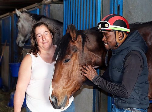 George Williams / Winnipeg Free Press
Trainer Lise Pruitt and jockey Antonio Whitehall with Crowned Royal, one of the horses that helped them both score hat tricks on Tuesday night at Assiniboia Downs. 