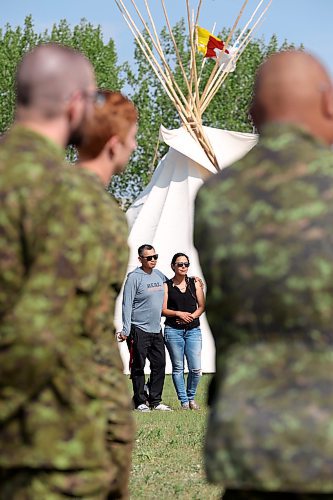 26052023
Cameron and Charity West, who are walking across Canada to bring attention to Indigenous Men, Women and Children who have gone missing, take part in an event celebrating the end of Indigenous Awareness Week events at CFB Shilo on Friday. Indigenous Awareness Week is an annual event celebrated nationally throughout the Canadian Armed Forces. 
(Tim Smith/The Brandon Sun)