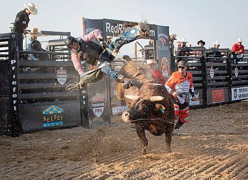 JESSICA LEE / WINNIPEG FREE PRESS

A bull rider is photographed at Professional Bull Riding Bull&#x2019;s NightOut May 26, 2023 at Red River Ex. Dozens of bull riders competed in front of a crowd of a few hundred to be crowned the bull riding champion.

Stand up