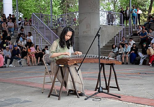 JESSICA LEE / WINNIPEG FREE PRESS

Isabella Zhu plays the guzheng May 27, 2023 at The Forks during an event celebrating Asian Heritage Month.

Stand up