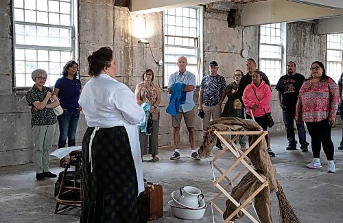 JESSICA LEE / WINNIPEG FREE PRESS

Kathy Krawchenko (in white) talks about the history of the Vaughn Street Jail while visitors observe the building May 27, 2023 as part of Doors Open Winnipeg, where many previously closed to the public buildings are open for public touring.

Stand up