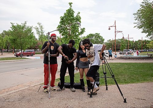JESSICA LEE / WINNIPEG FREE PRESS

From left to right: Idong, Director JK, Eliza Cruz and Zaiam are photographed May 27, 2023 at The Forks where they are filming a music video.

Stand up
