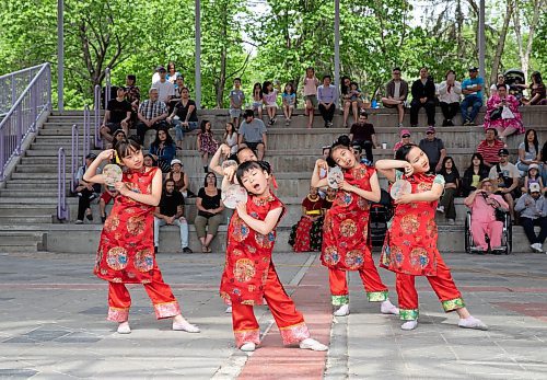 JESSICA LEE / WINNIPEG FREE PRESS

From left to right: Dancers Alexia Wang, 9, Ivy Cook, 7, Tina Lu, 6, Emily Xu, 9, and Ivy He, 8, perform a dance May 27, 2023 at The Forks during an event celebrating Asian Heritage Month.

Stand up