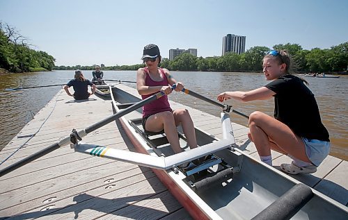JOHN WOODS / WINNIPEG FREE PRESS
Rowing volunteer Kate Mazar, right, instructs Tara Everett at the national Come Try Rowing Day event at the Winnipeg Rowing Club Sunday, May 28, 2023. 

Re: standup