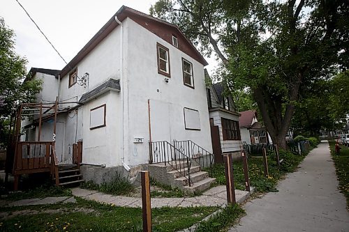 JOHN WOODS / WINNIPEG FREE PRESS
Sel Burrows, community advocate, is concerned that the city is planning to have six seized Point Douglas homes, including this one at 124 Lisgar, redeveloped by a non-profit group in Winnipeg, Monday, May 29, 2023. Burrows says it looks good on paper but does nothing for the critical social housing shortage.

Reporter: pindera
