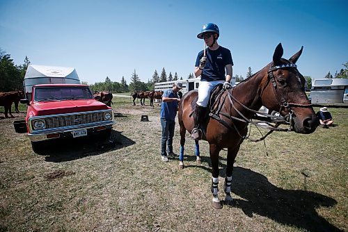 JOHN WOODS / WINNIPEG FREE PRESS
Regan Smith, who’s been playing polo since 5, and works and plays polo in the family business/team Rocking S Polo sits on his horse as his brother Garrett braids the horse’s tail at Springfield Polo Club in Birds Hill Park, Sunday, May 28, 2023.
Reporter: sanderson