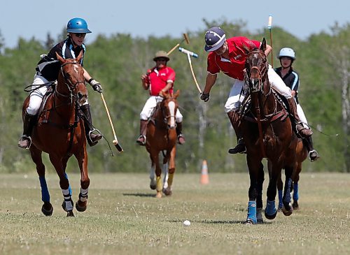 JOHN WOODS / WINNIPEG FREE PRESS
Bruce King, right, and Regan Smith, who&#x2019;s been playing polo since 5, and works and plays polo in the family business/team Rocking S Polo, play polo at Springfield Polo Club in Birds Hill Park, Sunday, May 28, 2023. 

Reporter: sanderson
