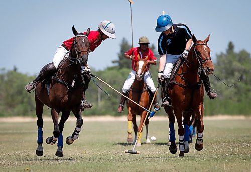 JOHN WOODS / WINNIPEG FREE PRESS
Brothers Regan, right, and Garrett Smith, who both work and play polo in the family business/team Rocking S Polo, play in a polo match at Springfield Polo Club in Birds Hill Park, Sunday, May 28, 2023. 

Reporter: sanderson