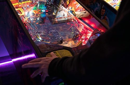 JESSICA LEE / WINNIPEG FREE PRESS

Jack Tadman, one of the top-ranked pinball players in North America, is photographed May 18, 2023 at The Forks Arcade, playing pinball.

Reporter: Dave Sanderson