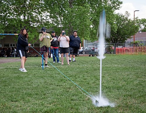 JESSICA LEE / WINNIPEG FREE PRESS

Keira Flett launches a bottle rocket while Delia Halek films at Windsor School May 30, 2023. About 160 students from Frontier, Louis Riel, Seven Oaks and St. James-Assiniboia School Divisions participated in Tipis and Telescopes where they learned from Elder Wilfred Buck and Dr. Juan Carlos Chavez, leaders in Indigenous knowledge and star stories.

Reporter: Graham