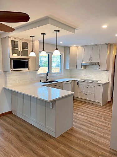 Photos by Marc LaBossiere / Winnipeg Free Press
The decorative ceiling bulkhead and peninsula island showcase an open-concept kitchen design that provides functionality and a beautiful aesthetic.
 