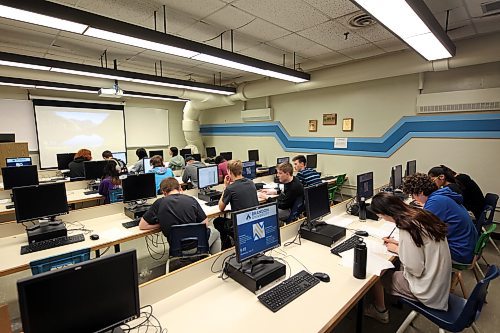 Local high school students from Vincent Massey, Neelin, Crocus Plains and Virden Collegiate Institute were drawn into random teams to solve coding-based problems at Brandon University on Wednesday.  (Colin Slark/The Brandon Sun)