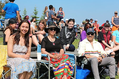 Sabrina Ricker, BU student, Karen batson, BU faculty member, and Roddy Batson, former BU graduate, wait for the “Our Journey, Indigenous Student Graduation Celebration" to begin at the Riverbank Discovery Centre in Brandon on Wednesday. (Michele McDougall, The Brandon Sun)