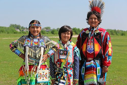 Siblings Briella, Brody and Bryce Hanska from Sioux Valley who dance together are preparing for the grand entry at the “Our Journey, Indigenous Student Graduation Celebration" at the Riverbank Discovery Centre in Brandon on Wednesday. (Michele McDougall, The Brandon Sun)