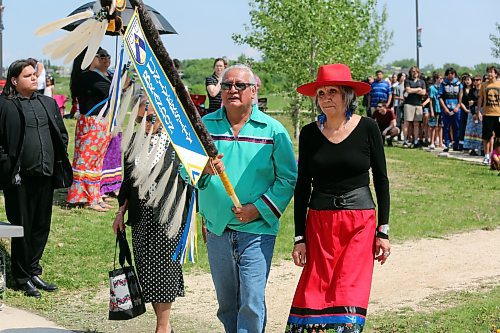 Frank Tacan, spiritual leader, and Mary Jane McCallum, chancellor at BU lead the grand entry for the “Our Journey, Indigenous Student Graduation Celebration" at the Riverbank Discovery Centre in Brandon on Wednesday. (Michele McDougall, The Brandon Sun)