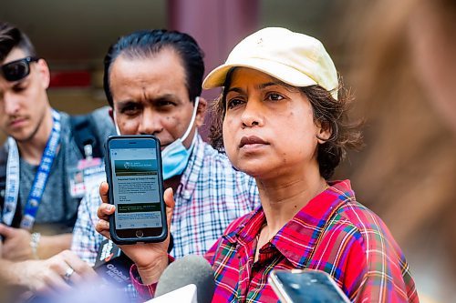 MIKAELA MACKENZIE / WINNIPEG FREE PRESS

Parents Niranjan (left) and Archana Paul speak to the media outside of HSC Children&#x573; Hospital, where injured St. John&#x573;-Ravencourt students were taken after a bridge collapsed during a field trip at Fort Gibraltar, on Wednesday, May 31, 2023. For Maggie/Chris/Erik story.
Winnipeg Free Press 2023