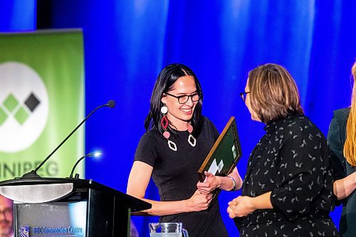 MIKAELA MACKENZIE / WINNIPEG FREE PRESS

RBC On The Rise Award winner Emily Solstice Tait accepts her award at the Mayor's Luncheon for the Arts at the RBC Convention Centre on Thursday, June 1, 2023. For Al Small story.
Winnipeg Free Press 2023