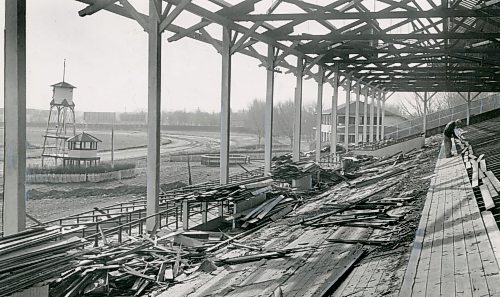 WINNIPEG FREE PRESS ARCHIVES

Piles of lumber litter the stands at Polo Park Race Track where just this summer thousands cheered  for their horses. The stands, clubhouseand stables are being taken down and the area will eventually sport a shopping centre. Most of the lumber shown here will be sold.
October 15, 1956