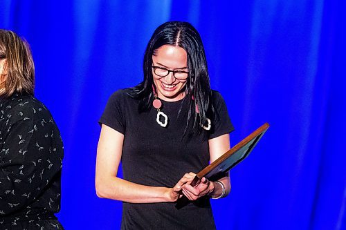 MIKAELA MACKENZIE / WINNIPEG FREE PRESS

RBC On The Rise Award winner Emily Solstice Tait accepts her award at the Mayor's Luncheon for the Arts at the RBC Convention Centre on Thursday, June 1, 2023. For Al Small story.
Winnipeg Free Press 2023