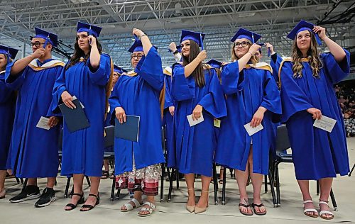 Brandon University Faculty of Education graduates move their tassels during the Thursday afternoon convocation ceremony at the Healthy Living Centre. (Matt Goerzen/The Brandon Sun)
