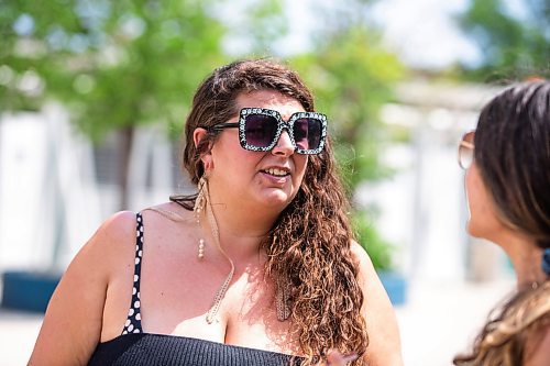 MIKAELA MACKENZIE / WINNIPEG FREE PRESS

Lindsay Stevenson speaks to the Free Press at the splash pad in Central Park on Friday, June 2, 2023. Environment Canada has put out a weather warning for the extreme heat coming this weekend. For Tessa Adamski story.
Winnipeg Free Press 2023