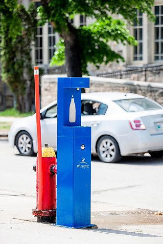 MIKAELA MACKENZIE / WINNIPEG FREE PRESS

A city hydration station in Central Park on Friday, June 2, 2023. Environment Canada has put out a weather warning for the extreme heat coming this weekend. For Tessa Adamski story.
Winnipeg Free Press 2023