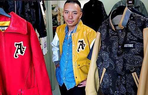 RUTH BONNEVILLE / WINNIPEG FREE PRESS
BIZ - Astige
Portraits of Derick De Leon, founder of Astige wearing one of his favourite jackets that he designed at Honesty Sportwear Manufacturing at 822 Main St. (where the jackets are made).
Derick uses quality leather that he incorporates inside the pockets and also highlights the Filipino flag and the letter A, for Astige in his designs.
What: Astige is a Winnipeg-based clothing brand that highlights Filipino fashion. This is for a feature spotlighting two male fashion designers
See story by Gabby
June 1st 2023