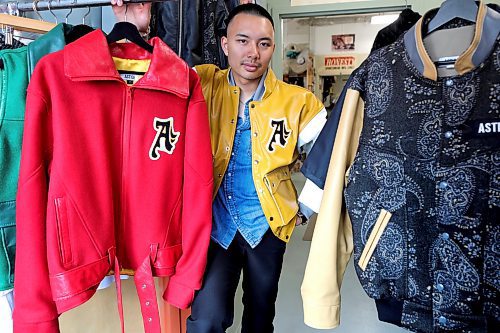RUTH BONNEVILLE / WINNIPEG FREE PRESS
BIZ - Astige
Portraits of Derick De Leon, founder of Astige wearing one of his favourite jackets that he designed at Honesty Sportwear Manufacturing at 822 Main St. (where the jackets are made).
Derick uses quality leather that he incorporates inside the pockets and also highlights the Filipino flag and the letter A, for Astige in his designs.
What: Astige is a Winnipeg-based clothing brand that highlights Filipino fashion. This is for a feature spotlighting two male fashion designers
See story by Gabby
June 1st 2023