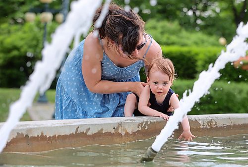 RUTH BONNEVILLE / WINNIPEG FREE PRESS 

Weather Standup - Leg fountain

Fourteen-month-old Abigail Toni refreshes herself in the cool fountain behind the Manitoba Legislature with the help of her mom, Kenzie Toni.  The two were out on a walk with other moms enjoying the summer-like weather Friday afternoon. 


June 2nd,  2023