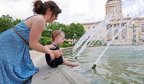RUTH BONNEVILLE / WINNIPEG FREE PRESS 

Weather Standup - Leg fountain

Fourteen-month-old Abigail Toni refreshes herself in the cool fountain behind the Manitoba Legislature with the help of her mom, Kenzie Toni.  The two were out on a walk with other moms enjoying the summer-like weather Friday afternoon. 


June 2nd,  2023