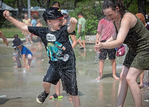 JESSICA LEE / WINNIPEG FREE PRESS

Ash Smolders, 6, enjoys the splash pad at The Forks June 3, 2023. Temperatures reached 31C.

Reporter: Malak Abas