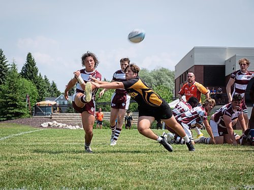 JESSICA LEE / WINNIPEG FREE PRESS

St. Paul&#x2019;s High School rugby player Dario Macchia (left) kicks the ball during a finals game June 3, 2023 against Dakota Collegiate at St. Paul&#x2019;s High School. The final score was 26-19 with St. Paul&#x2019;s winning.

Stand up