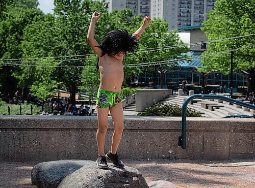 JESSICA LEE / WINNIPEG FREE PRESS

Phoenix Nepinak-Meeches, 6, jumps off a rock at The Forks June 3, 2023. Temperatures reached 31C.

Reporter: Malak Abas