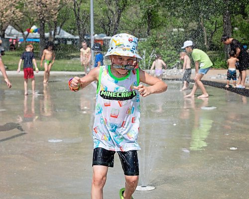 JESSICA LEE / WINNIPEG FREE PRESS

Jase Deslauriers, 8, enjoys the splash pad at The Forks June 3, 2023. Temperatures reached 31C.

Reporter: Malak Abas