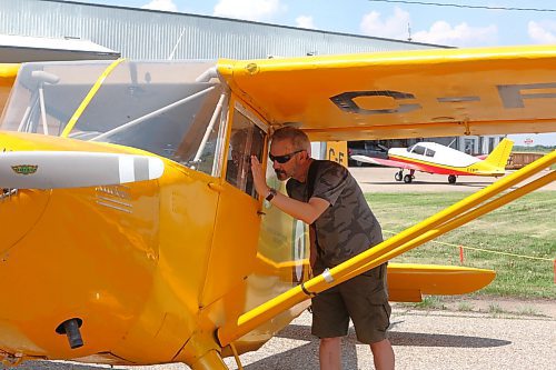 Tim Woelk drove all the way from Winnipeg with his wife Perla to take part in the Commonwealth Air Training Plan Museum’s grand reopening in Brandon. (Kyle Darbyson/The Brandon Sun)