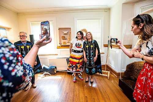 MIKAELA MACKENZIE / WINNIPEG FREE PRESS

Chancellor Anne Mahon models her new convocation robes with artist Jackie Traverse on Monday, June 5, 2023. Traverse designed the robes with beaded Ojibwe florals depicting prairie crocuses in the University of Manitoba&#x573; school colours.
Winnipeg Free Press 2023