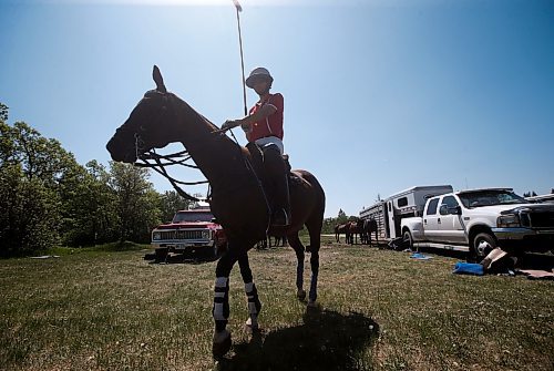JOHN WOODS / WINNIPEG FREE PRESS
Garrett Smith, who works and plays polo in the family business/team Rocking S Polo, head out for a polo match at Springfield Polo Club in Birds Hill Park, Sunday, May 28, 2023. 

Reporter: sanderson