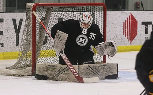 Dylan McFadyen (35) goes into the butterfly to make a save at Hockey Manitoba&#x2019;s Pursuit of Excellence camp on May 12 at J&amp;G Homes Arena. (Perry Bergson/The Brandon Sun)